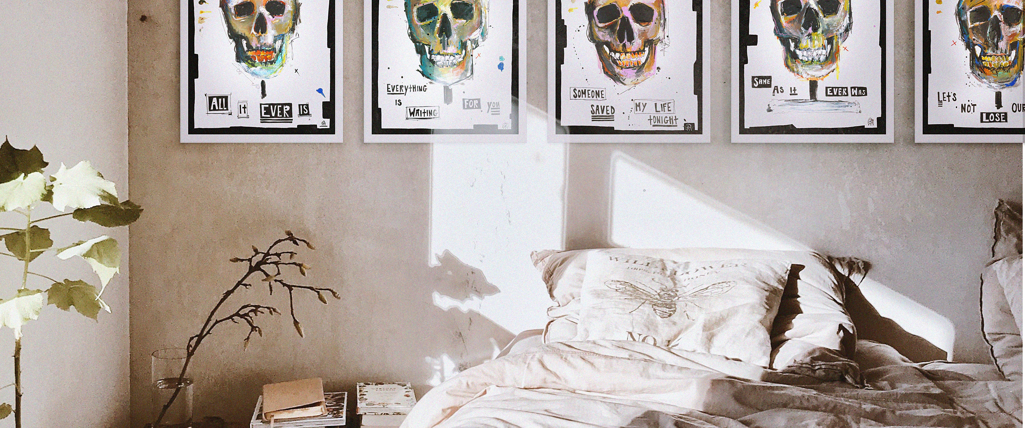 Lifestyle photograph of Kate.jjj's "Skull Series." A series of contemporary, acrylic paintings.